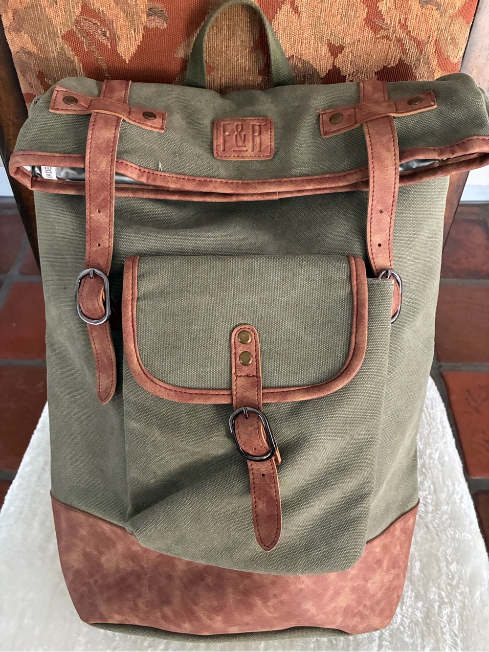 FOSTER & RYE insulated cooler wine backpack in olive green and brown.